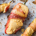 Dairy free jalapeno poppers on a baking sheet.