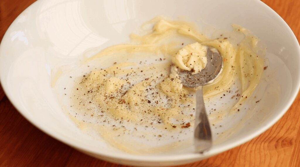 salt and pepper added to bowl