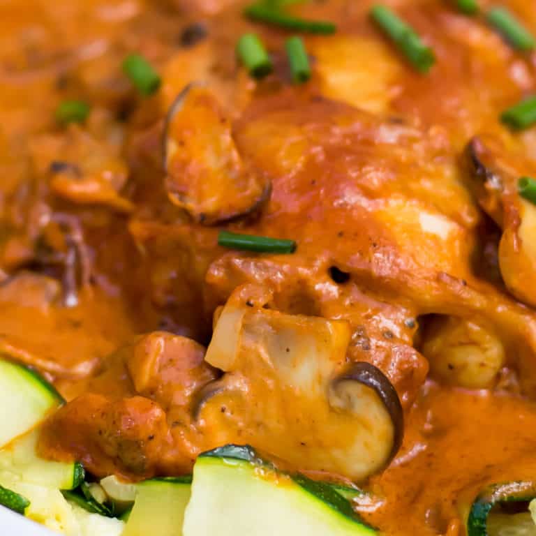 Close up of Brazilian Chicken Stroganoff over zucchini noodles.