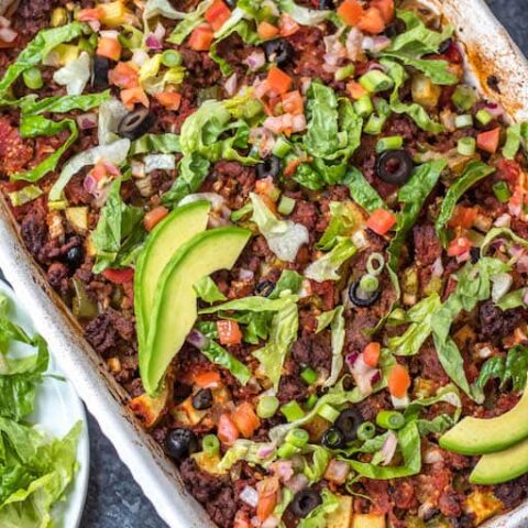 Overhead shot of taco casserole in a white dish.