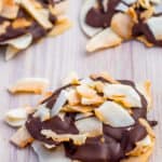 Coconut clusters on a wooden surface.