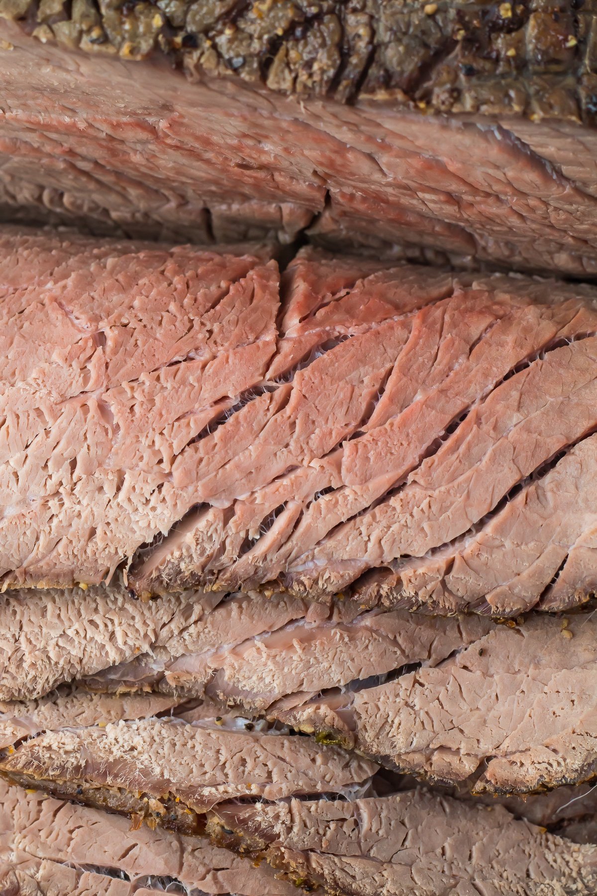 Close up of medium sliced roast beef.
