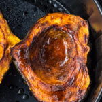 Roasted acorn squash in an air fryer.