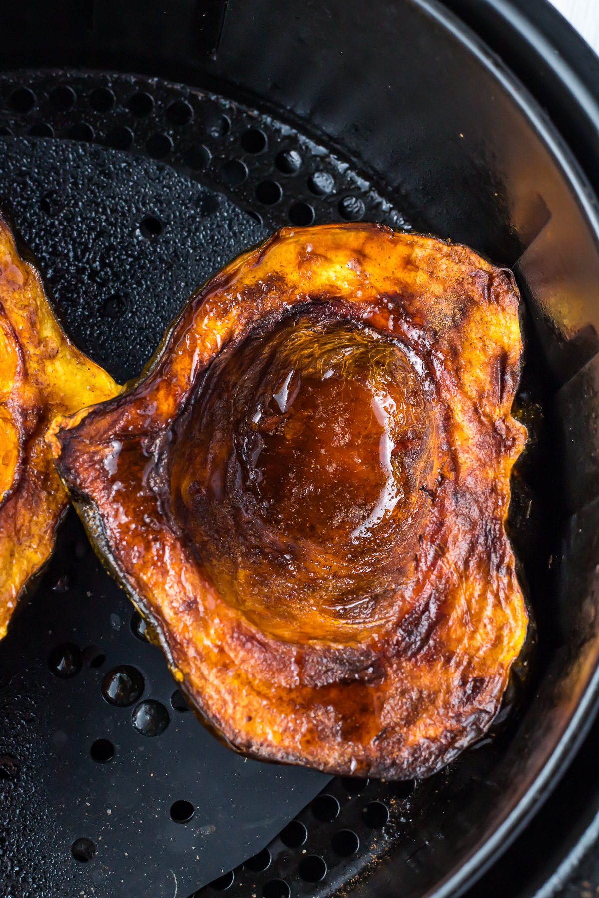 Roasted acorn squash in an air fryer.