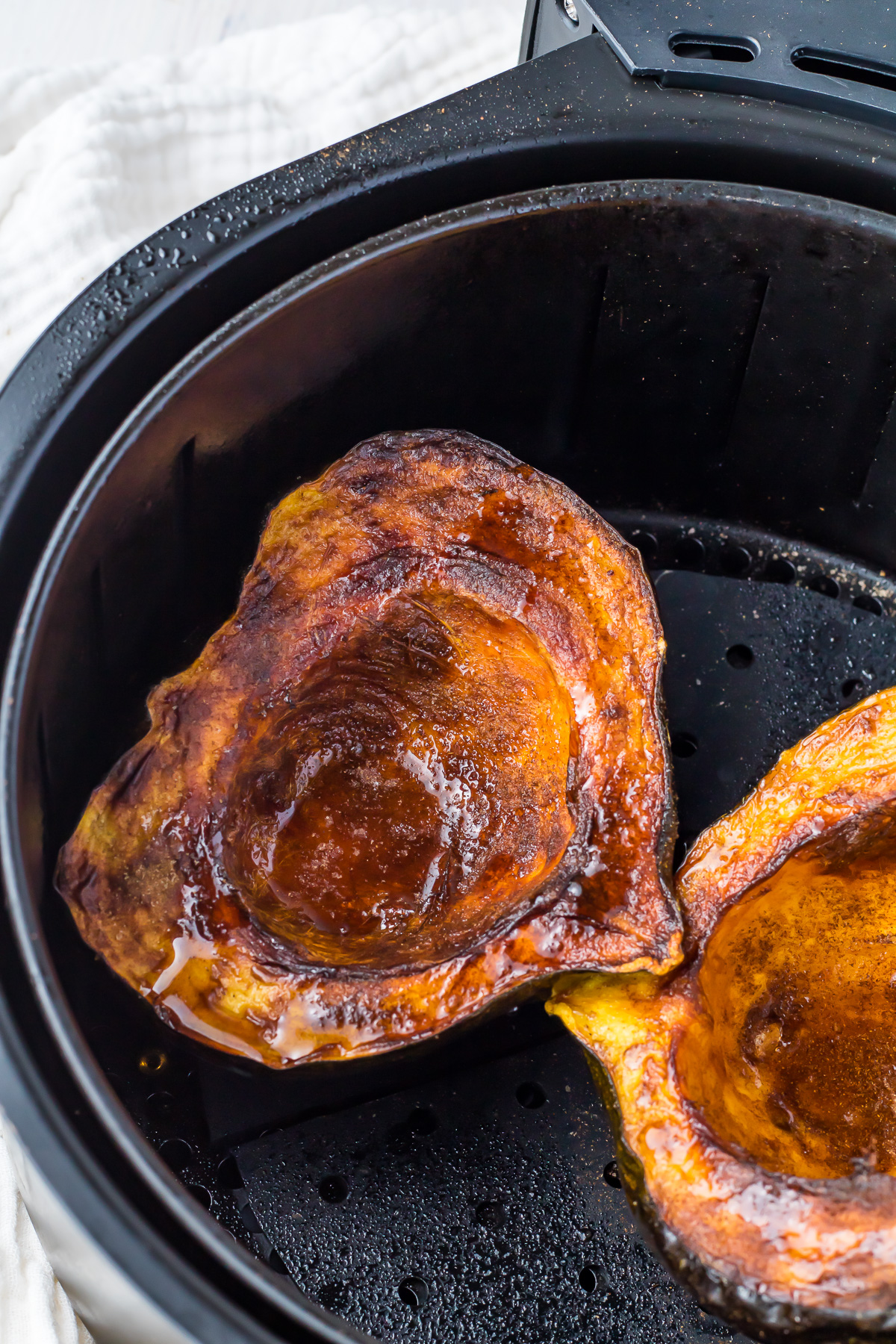 Roasted acorn squash in an air fryer.