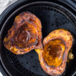 Roasted acorn squash in an air fryer.
