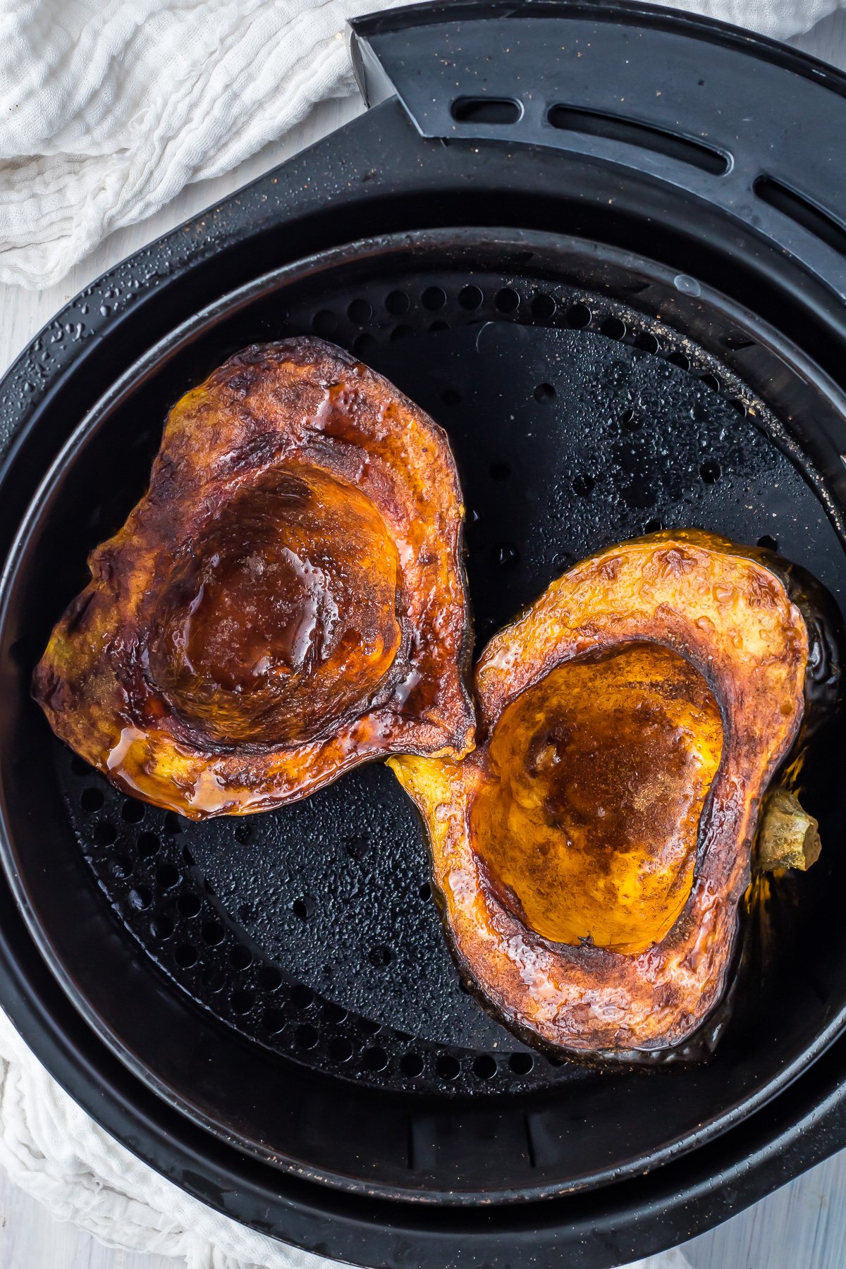 Roasted acorn squash in an air fryer.
