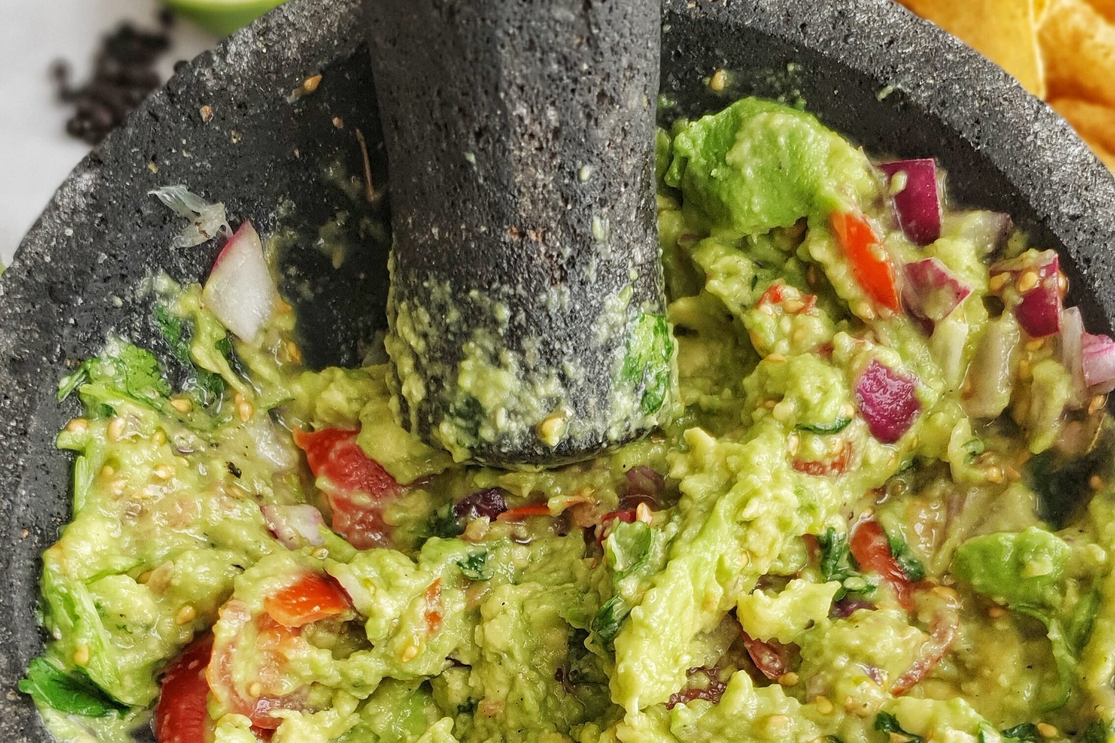 Mexican guacamole with the best Vegan Queso.