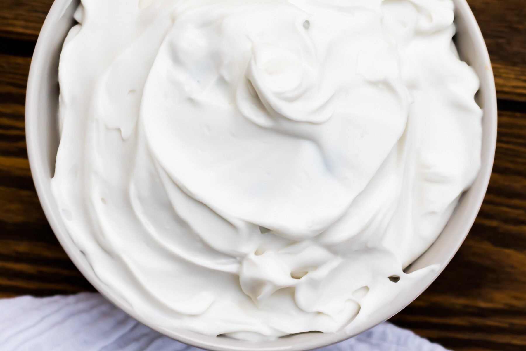 Overhead shot of vegan whipped cream in a bowl.