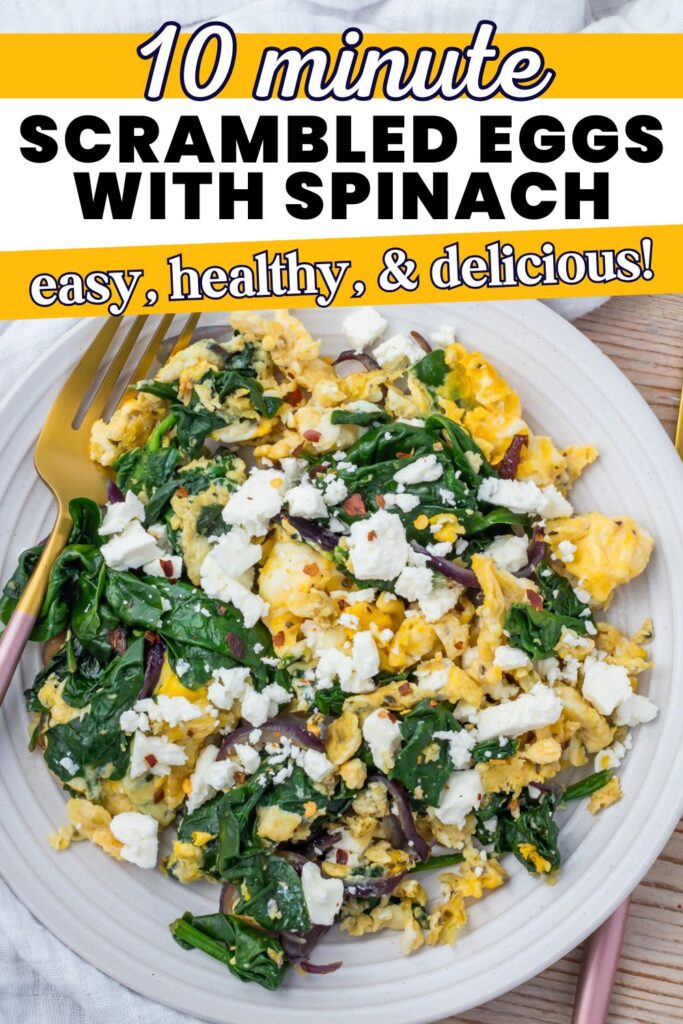 A plate of scrambled eggs with spinach, topped with crumbled feta and served with a gold fork. Text reads “10 minute scrambled eggs with spinach, easy, healthy, & delicious!”.