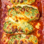 Spinach Ricotta Chicken Bake, baked in red tomato sauce.